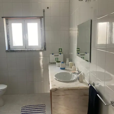 A Casa Do Telhado Preto *